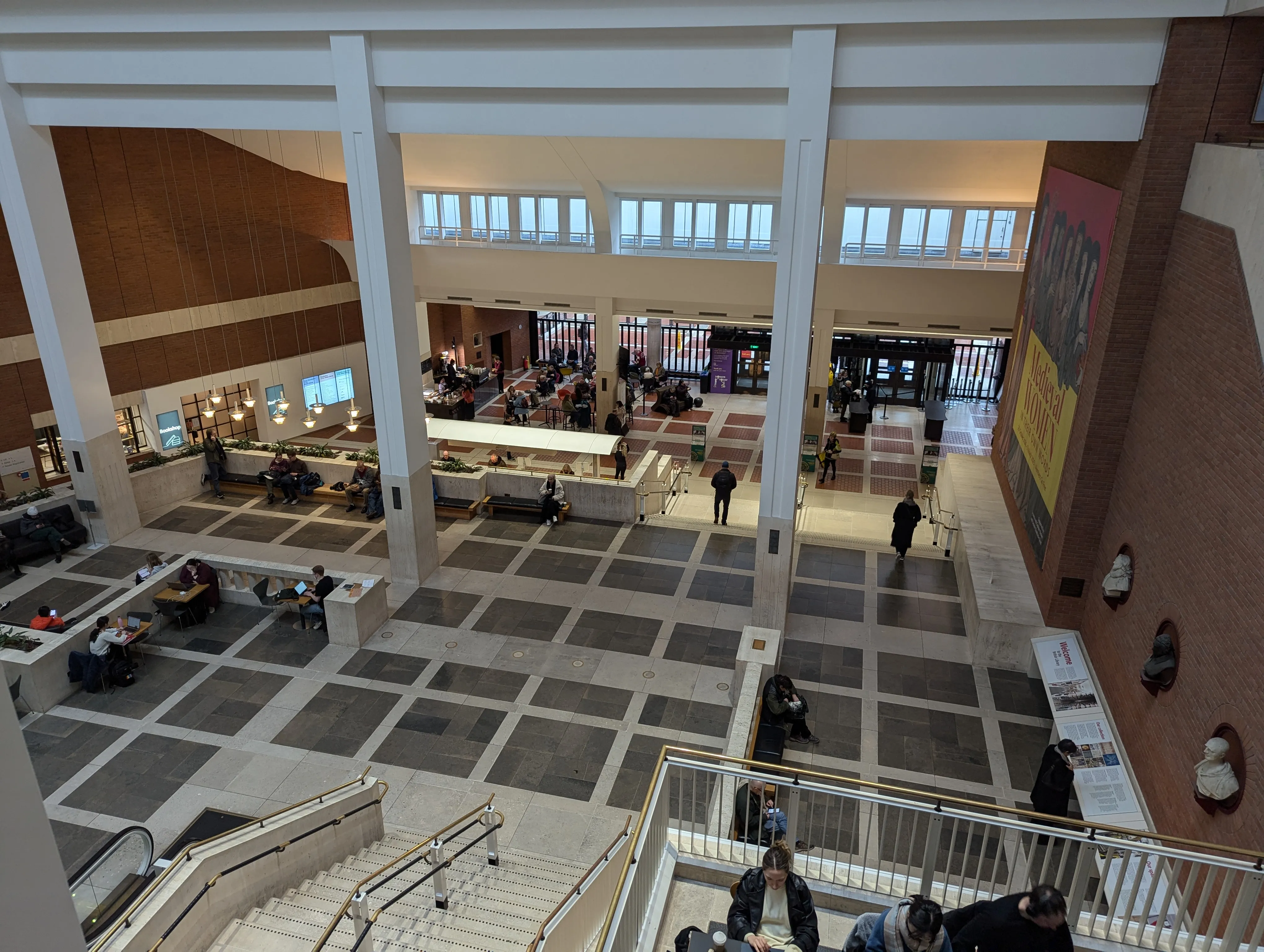 Overlooking the study space at the library from a balcony
